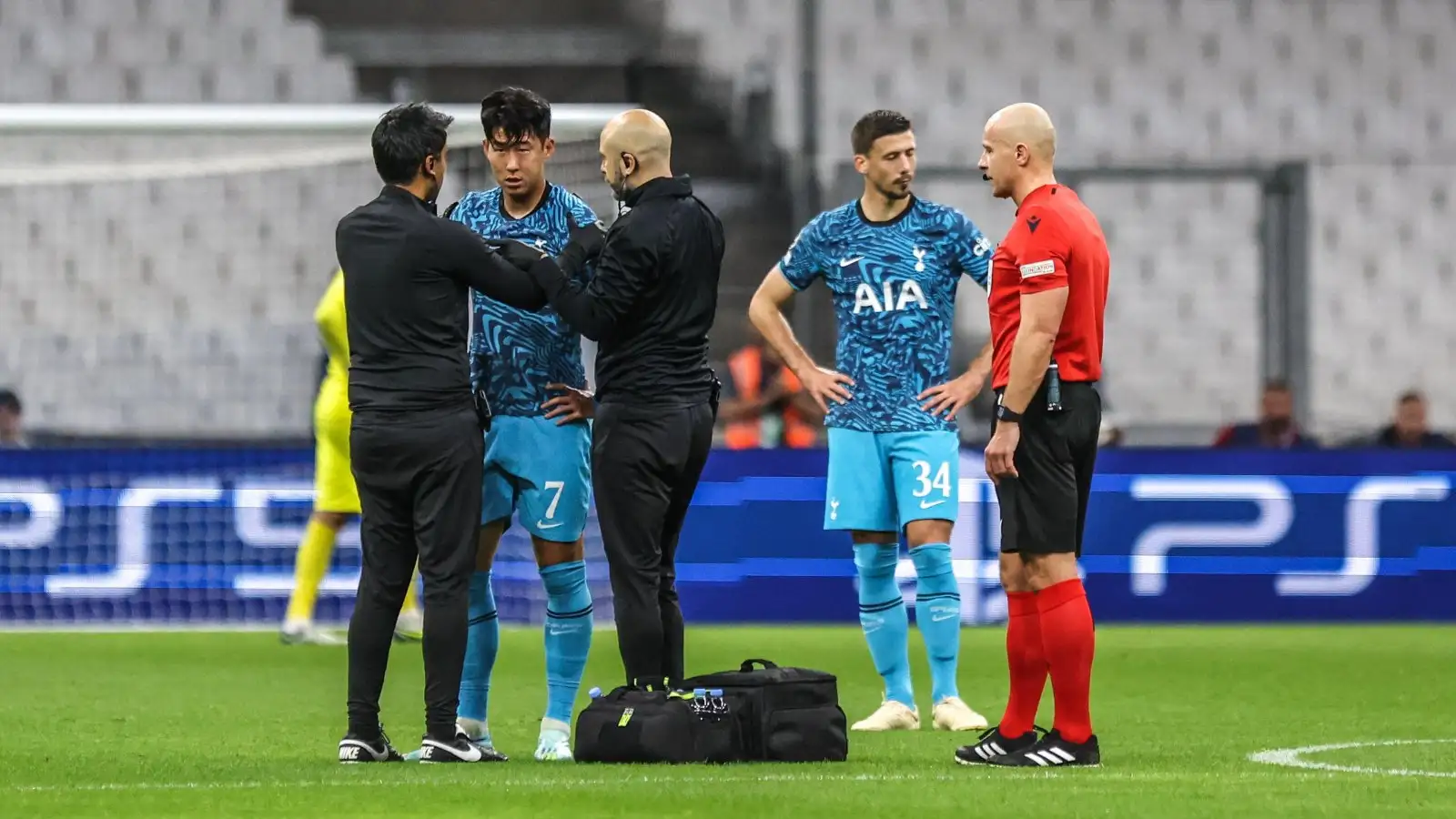 Tottenham forward Son Heung-min gets treatment for an injury