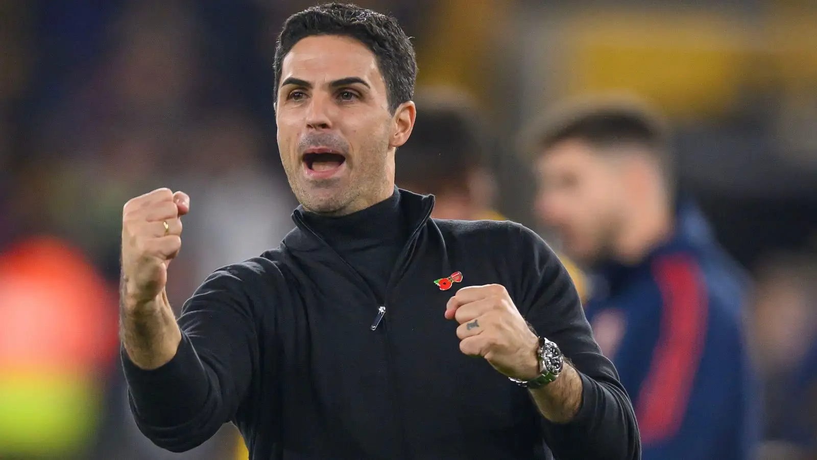 Mikel Arteta celebrates Arsenal's win at Wolves.