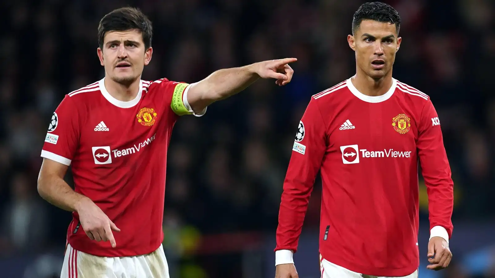 Harry Maguire and Cristiano Ronaldo in action for Manchester United.