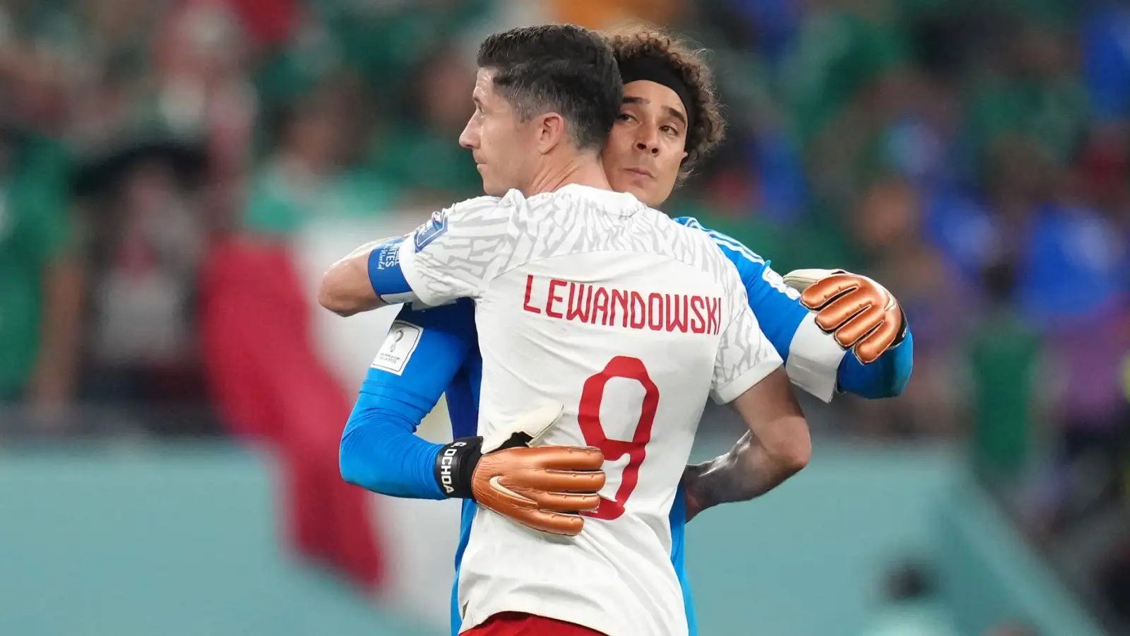 Robert Lewandowski and Guillermo Ochoa embrace after Poland and Mexico draw 0-0 at the 2022 World Cup