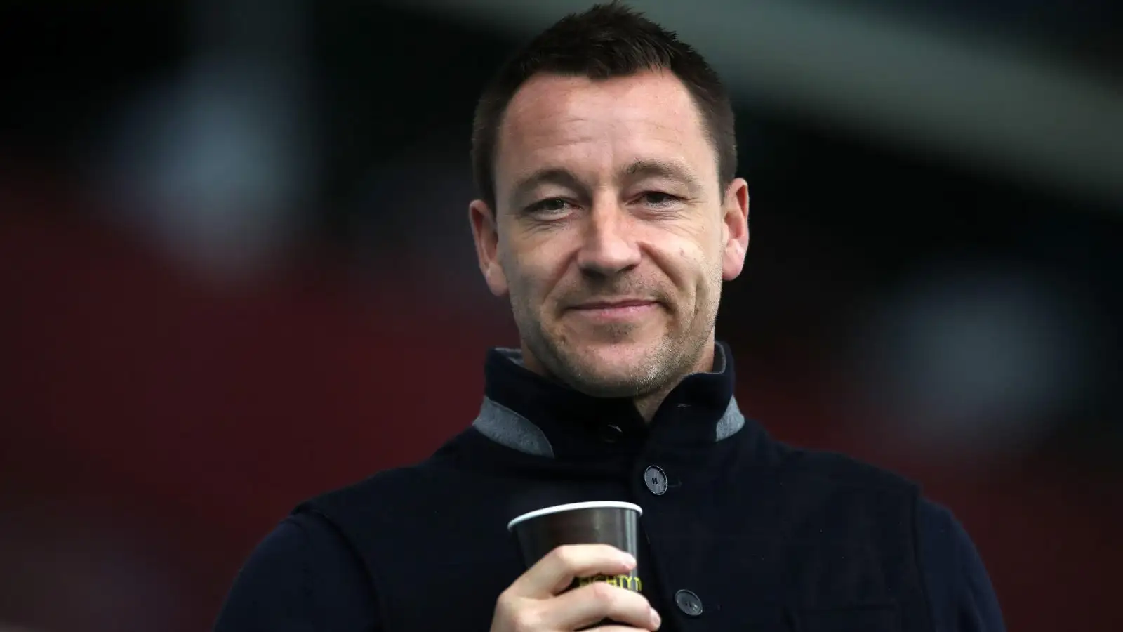 Previous England protector John Terry grasps a coffee