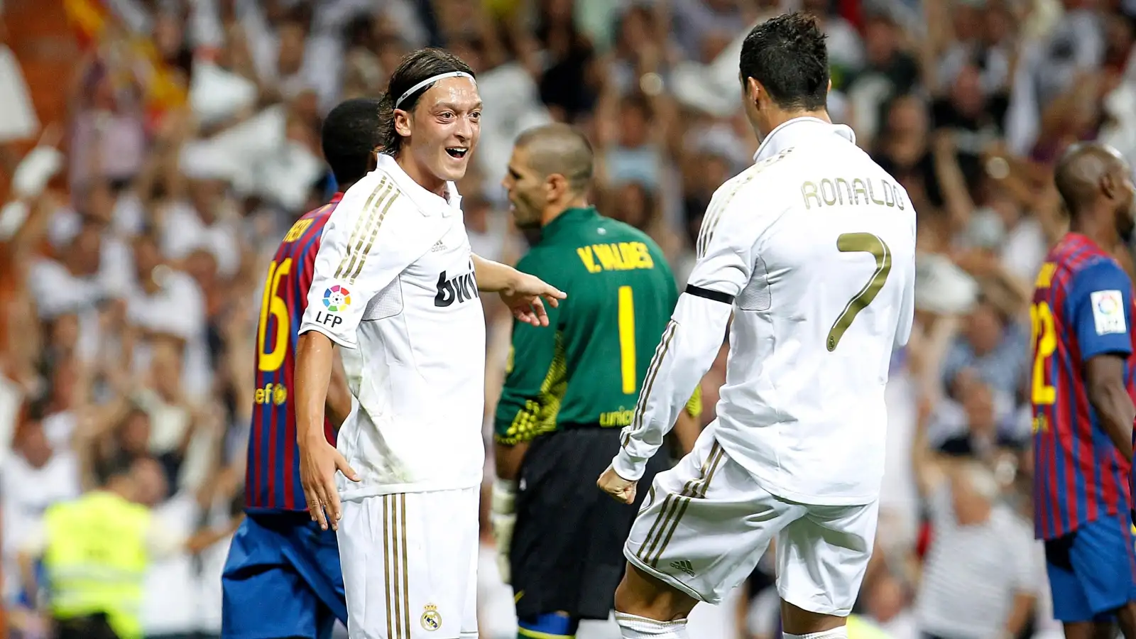 Mesut Ozil and Cristiano Ronaldo celebrate a goal