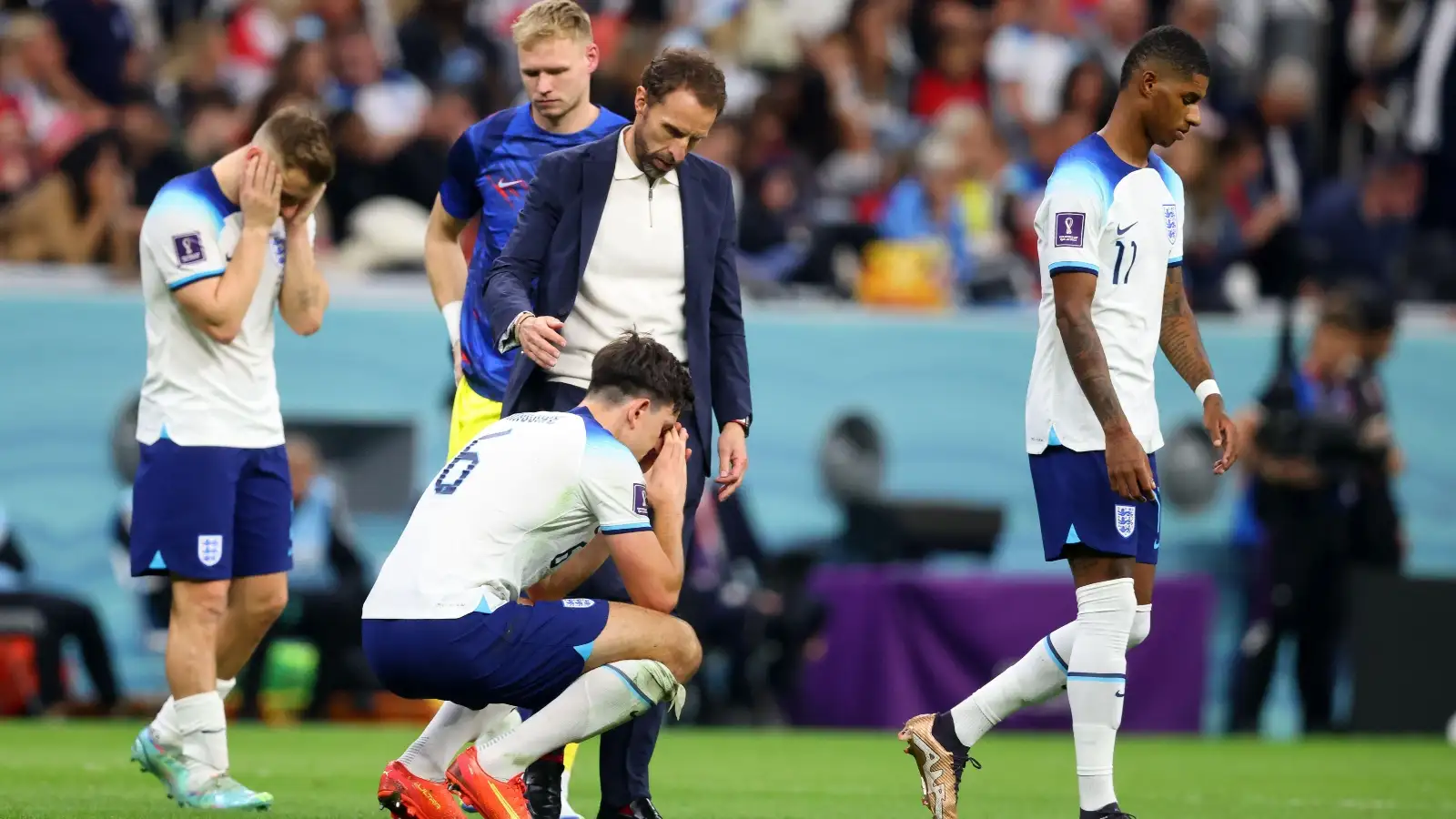 England manager Gareth Southgate and his players look dejected