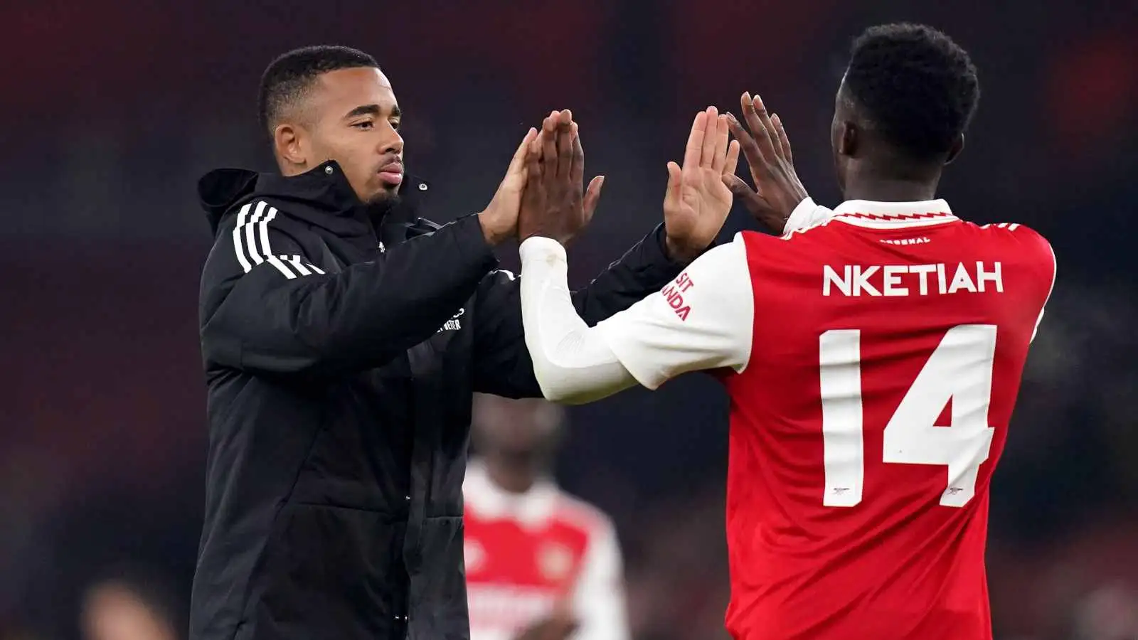 Arsenal pair Gabriel Jesus and Eddie Nketiah celebrate a win