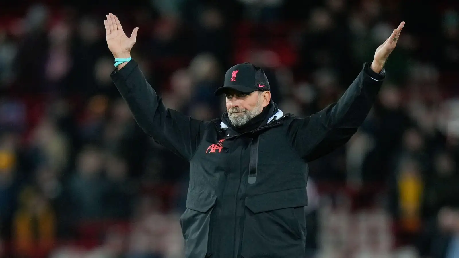 Liverpool boss Jurgen Klopp puts his arms in the air