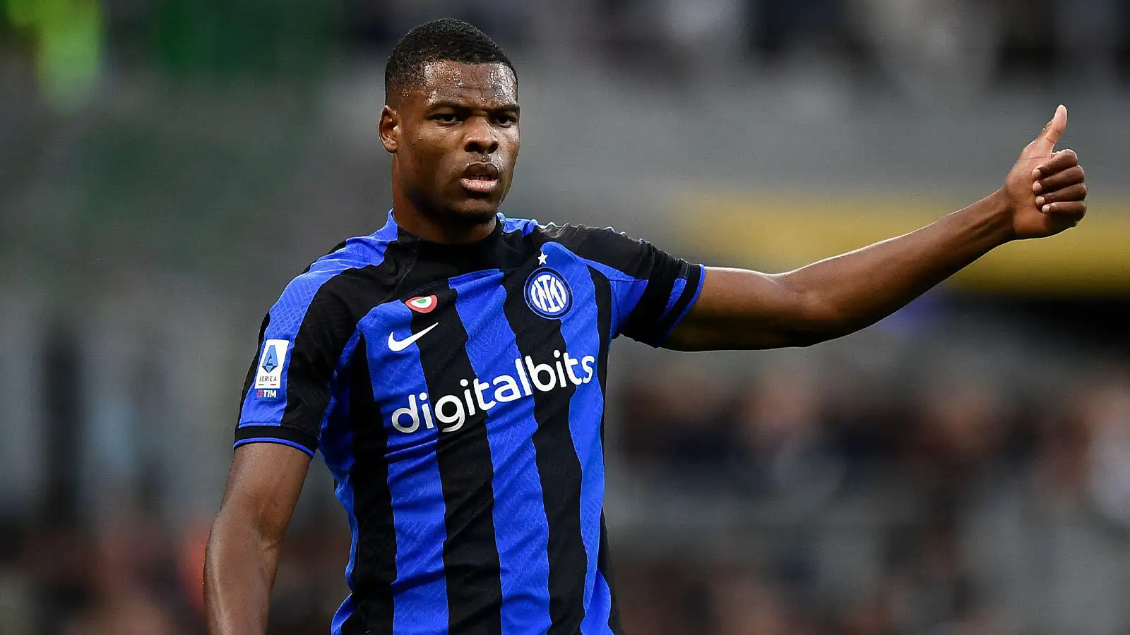 Denzel Dumfries of FC Internazionale motions during the Serie A football match between FC Internazionale and also AS Roma