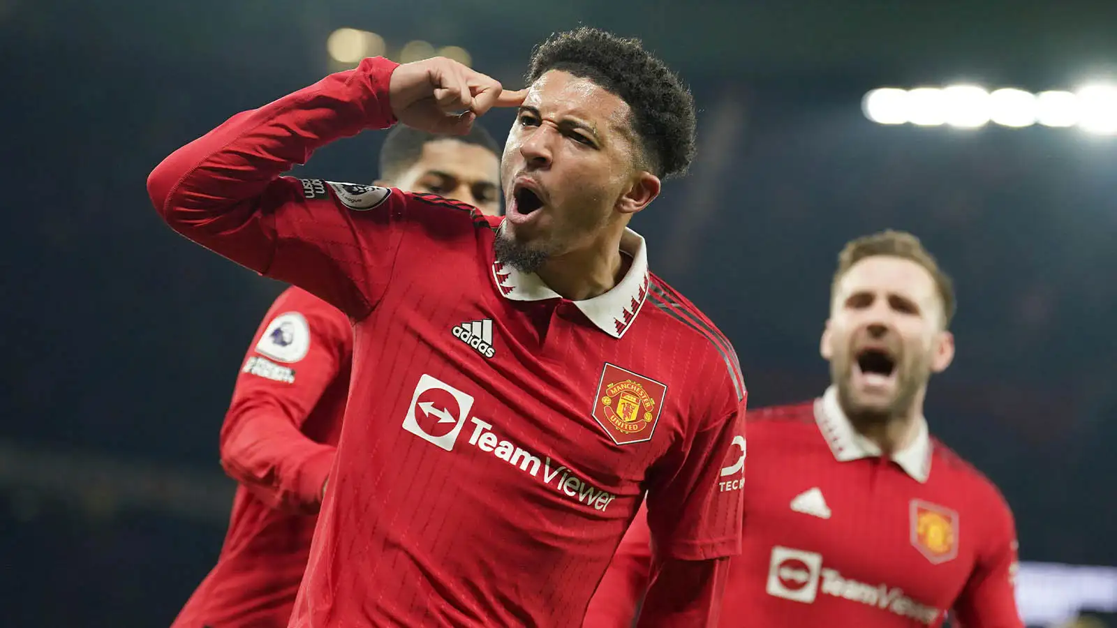 Manchester United's Jadon Sancho celebrates after scoring his sides second goal during the English Premier League soccer match between Manchester United and Leeds United at Old Trafford in Manchester, England, Wednesday, Feb. 8, 2023.