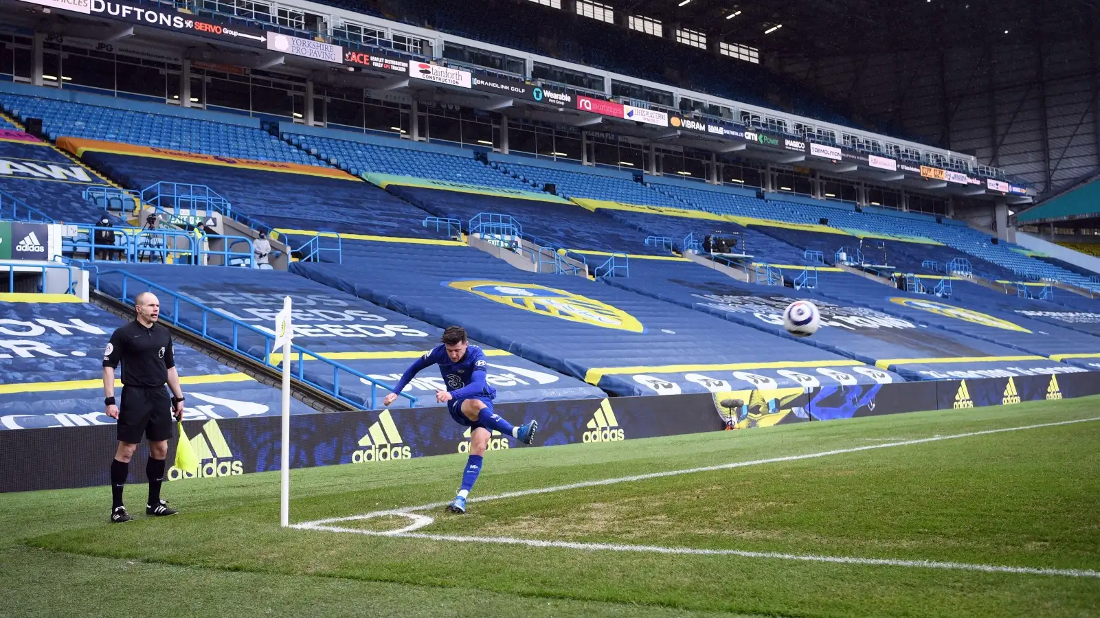 Mason Mount takes a corner in front of an empty stand at Elland Road.