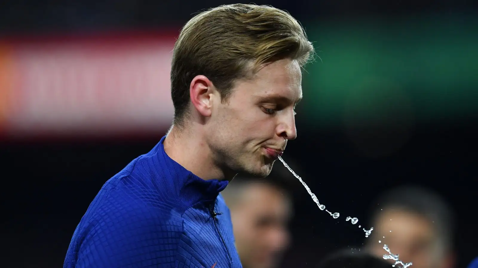Man Utd target Frenkie de Jong spits water out