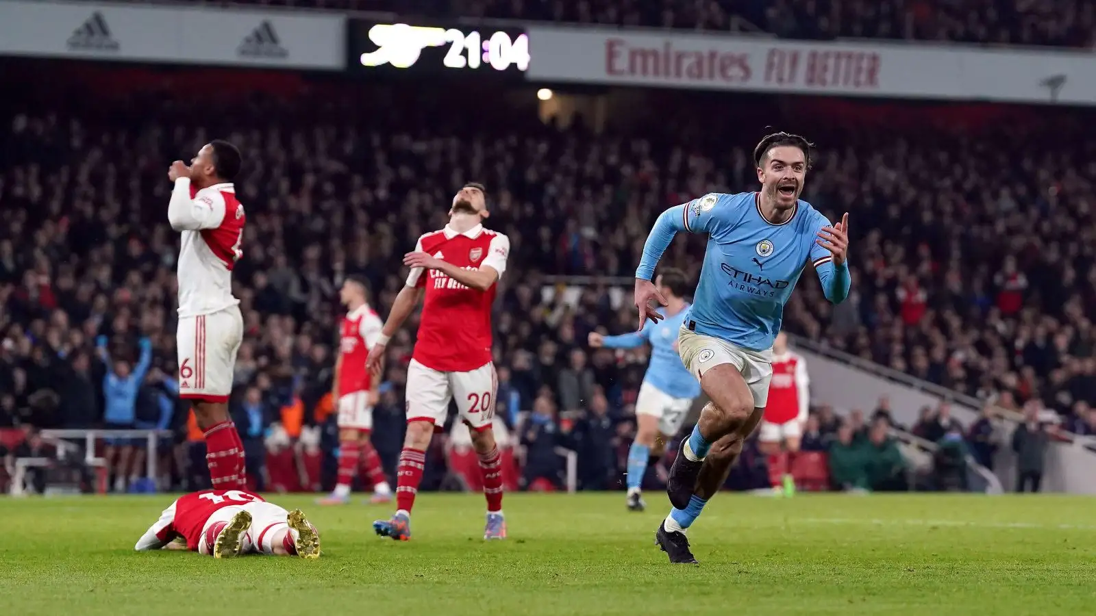 Jack Grealish celebrates scoring against Arsenal