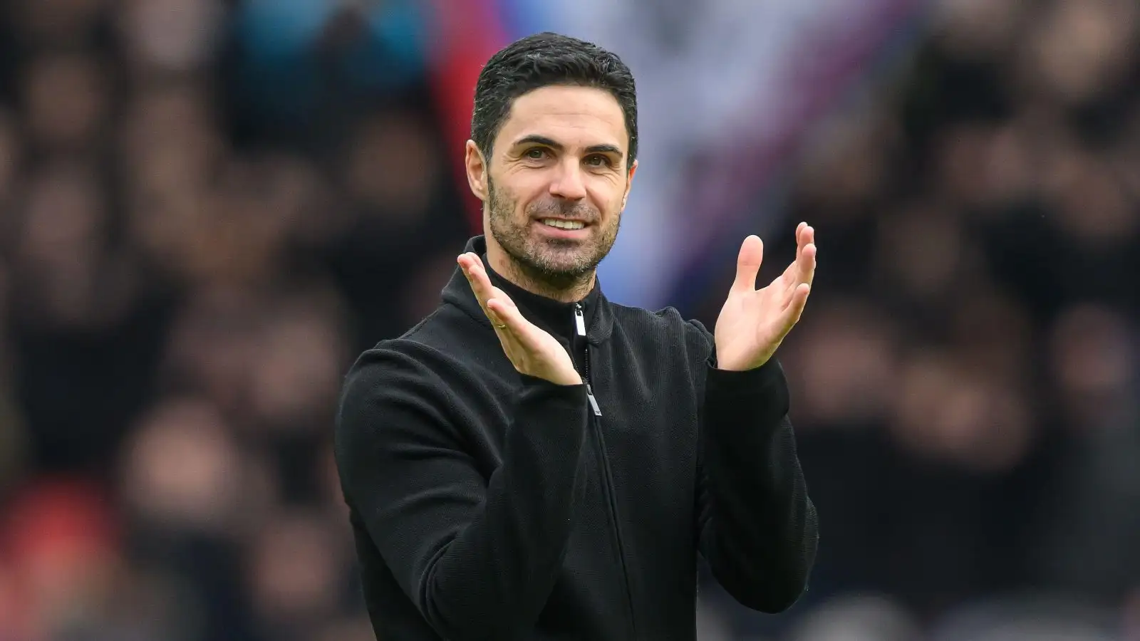 Arsenal boss Mikel Arteta claps the supporters