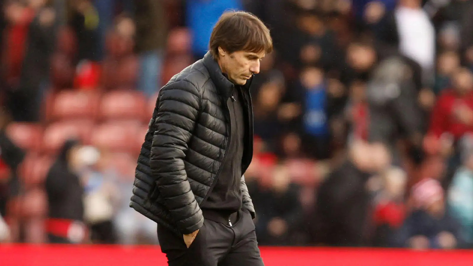 Tottenham's head coach Antonio Conte leaves the field at the end of the English Premier League soccer match between Southampton and Tottenham at St Mary's Stadium in Southampton, England, Saturday, March 18, 2023