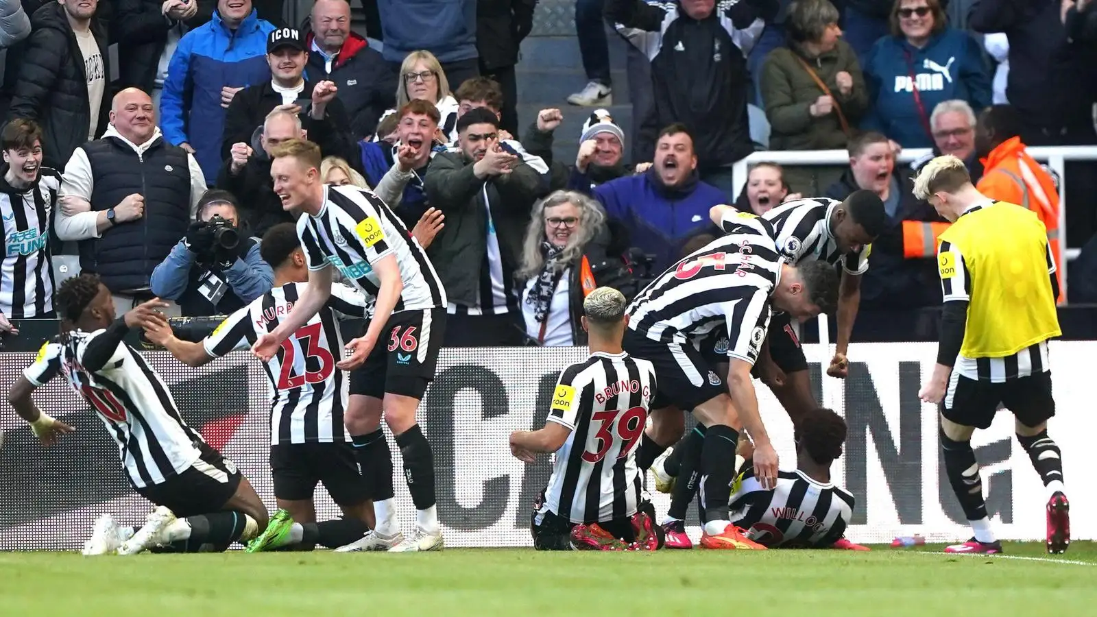 Newcastle players celebrate their goal