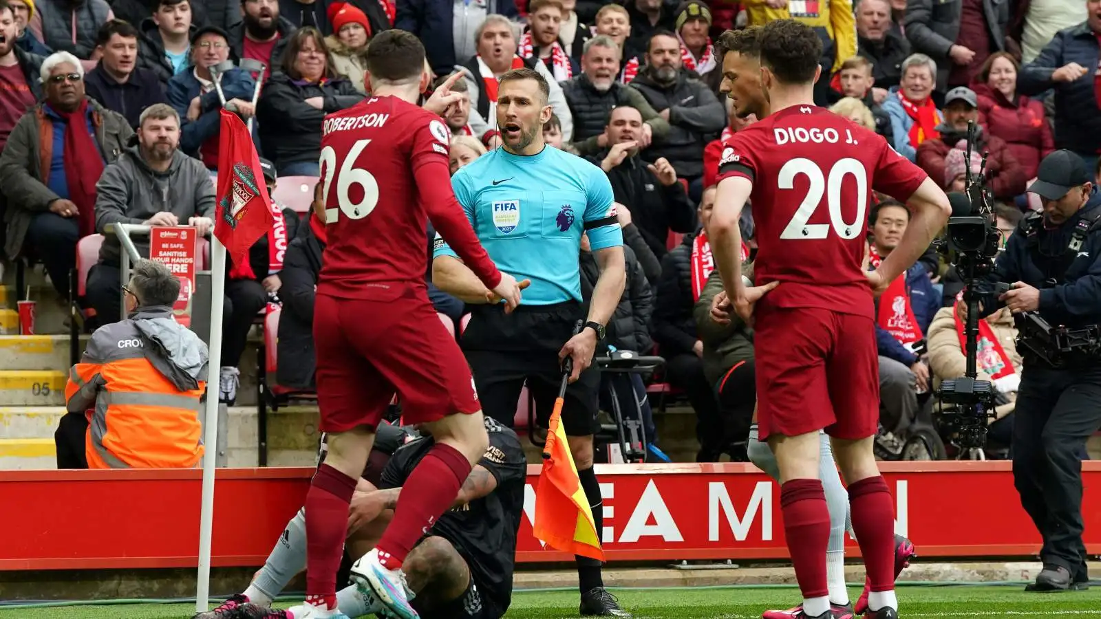 Liverpool defender Andy Robertson shouts at linseman Constantine Hatzidakis