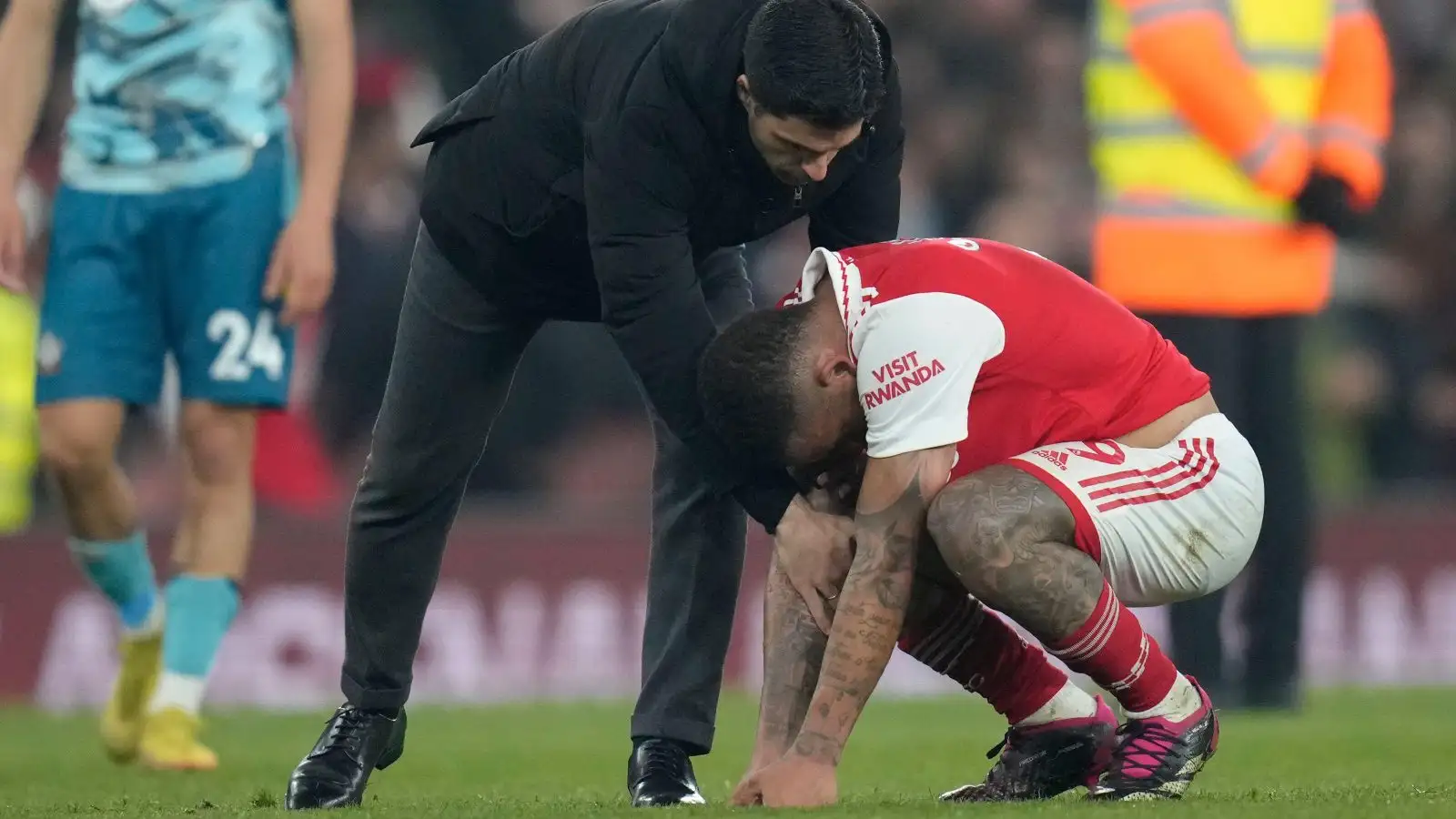 Arsenal manager Mikel Arteta consoles a dejected Gabriel Jesus