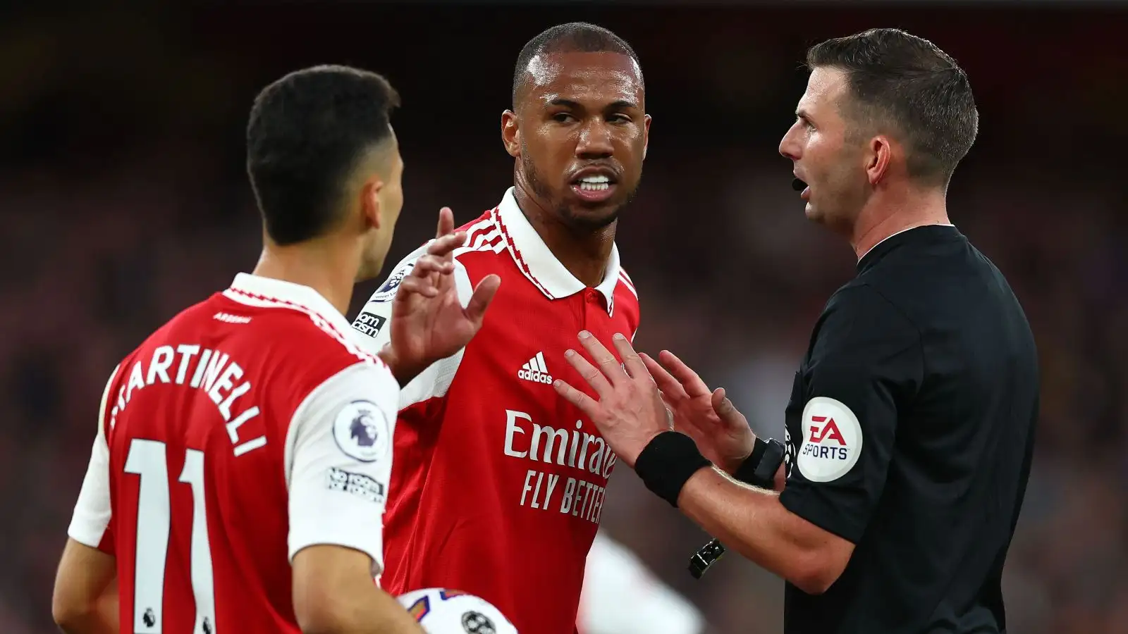 Arsenal defender Gabriel talks to referee Michael Oliver