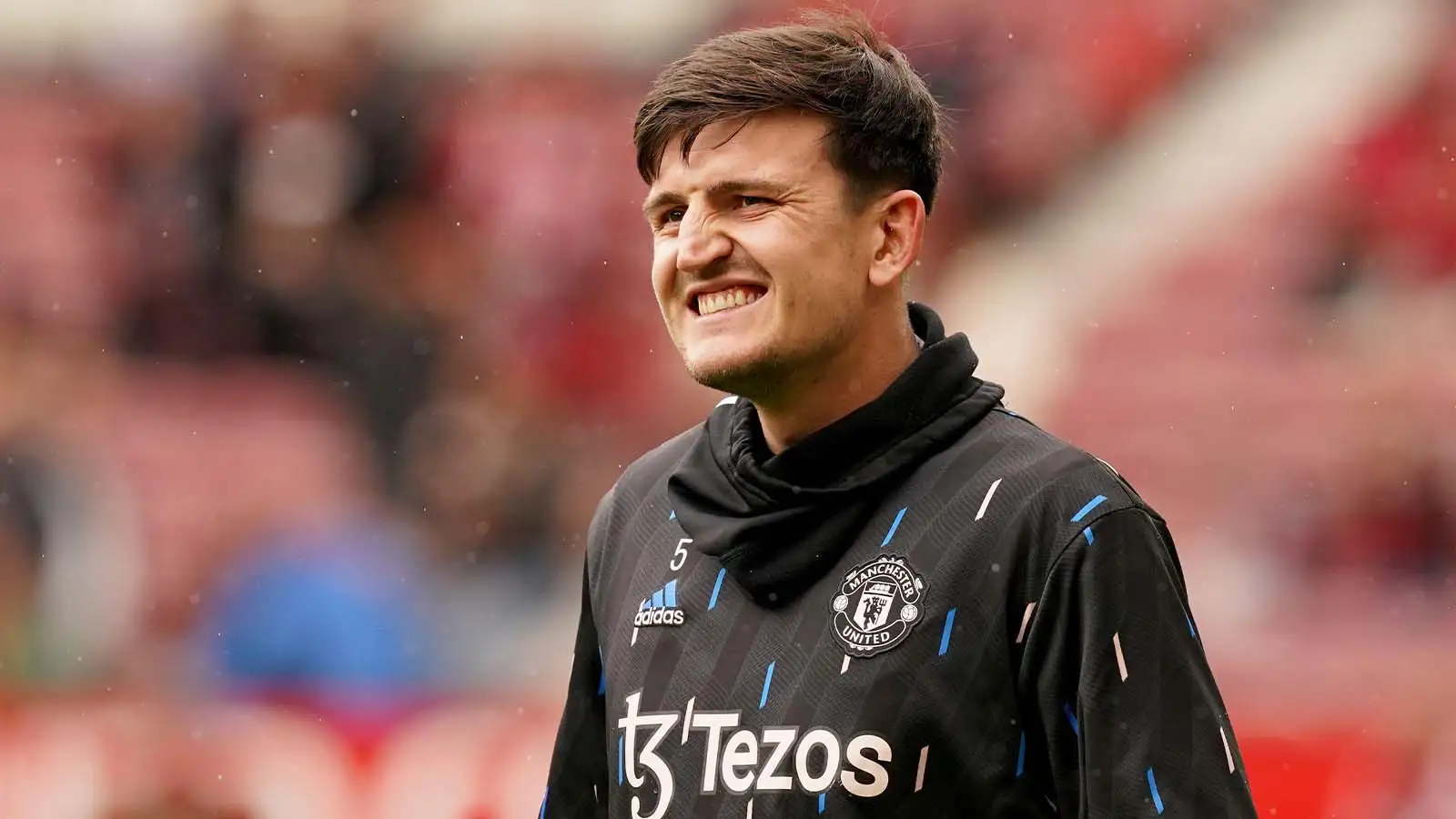 Manchester United's Harry Maguire warms up ahead of the Premier League match at Old Trafford, Manchester. Picture date: Sunday April 30, 2023.