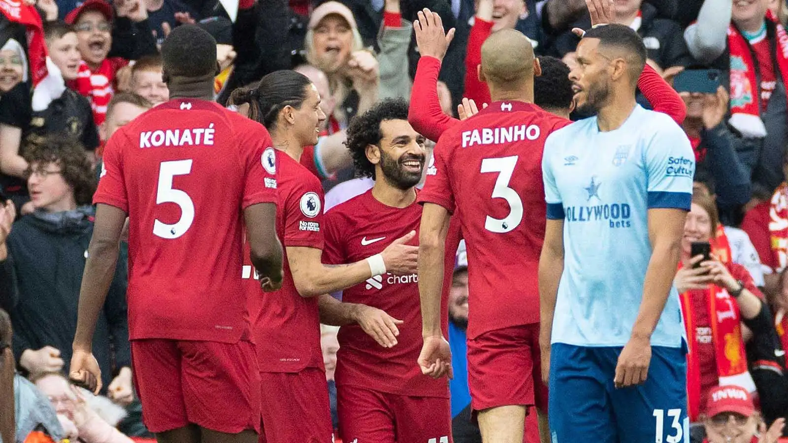 Mo Salah #11 of Liverpool celebrates his goal with team-mates during the Premier League match between Liverpool and Brentford at Anfield,