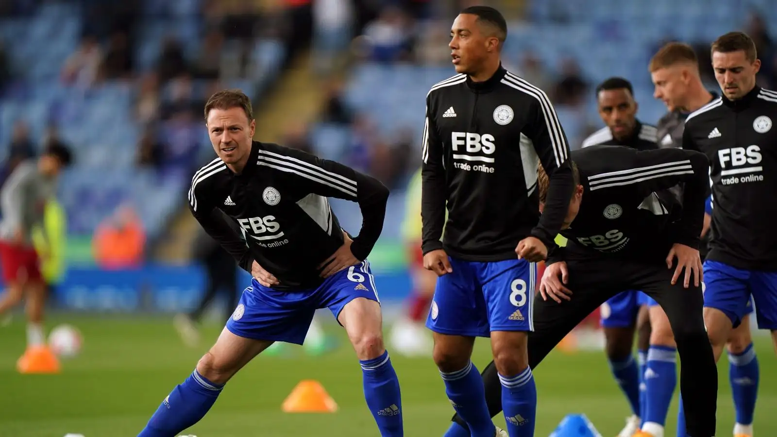 Leicester City players Jonny Evans and Youri Tielemans warming up before a match against Liverpool