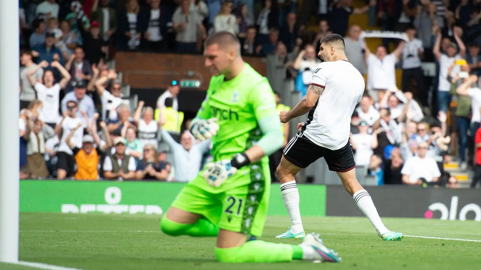 Fulham striker Aleksandar Mitrovic celebrates scoring a penalty