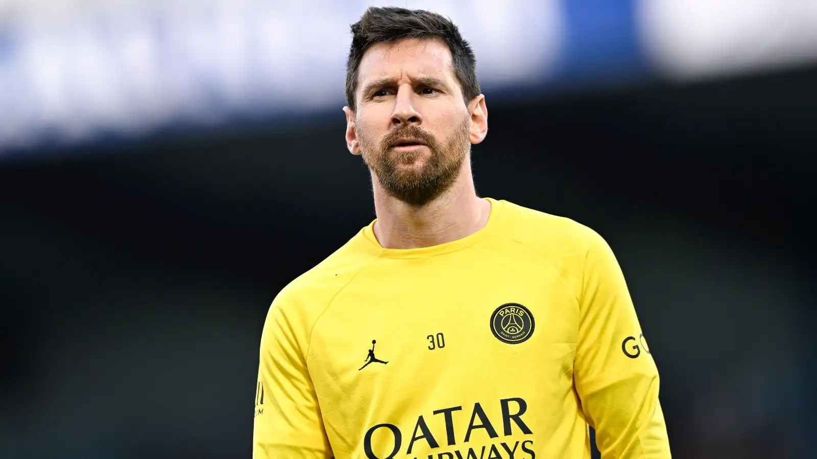 PSG star Lionel Messi looks serious