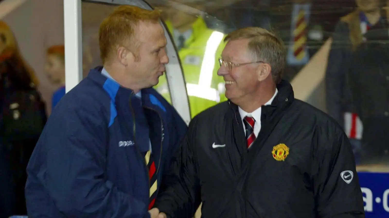 Alex McLeish shakes hands with Sir Alex Ferguson before a Champions League match between Rangers and Manchester United.