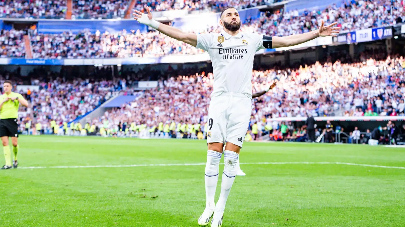 Karim Benzema celebrates after scoring his final goal for Real Madrid.