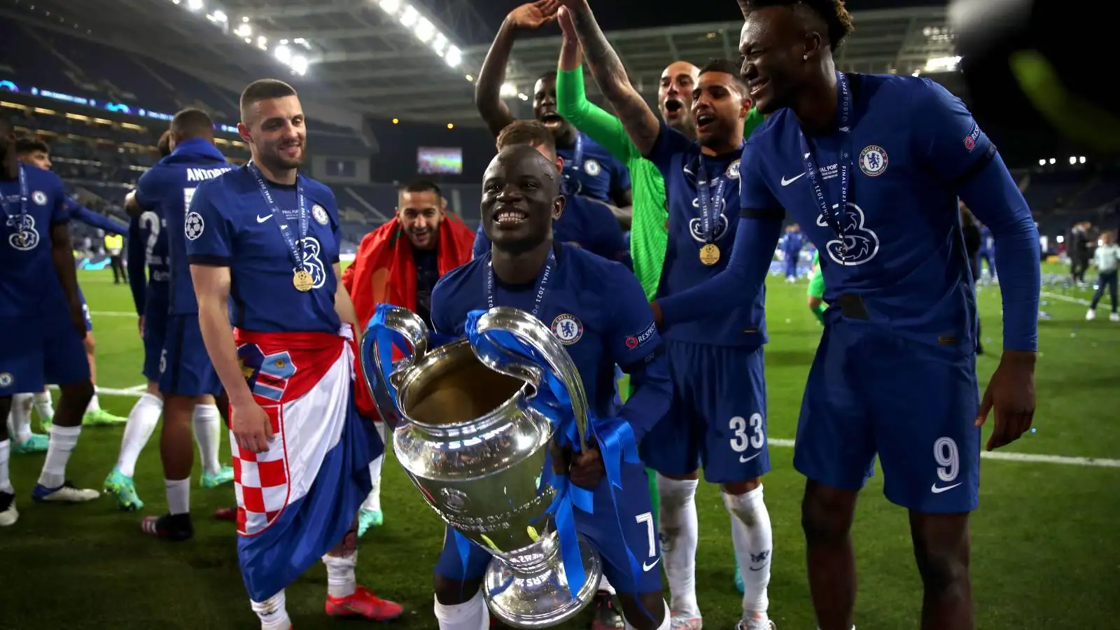 Chelsea midfielder N'Golo Kante celebrates winning the Champions League.