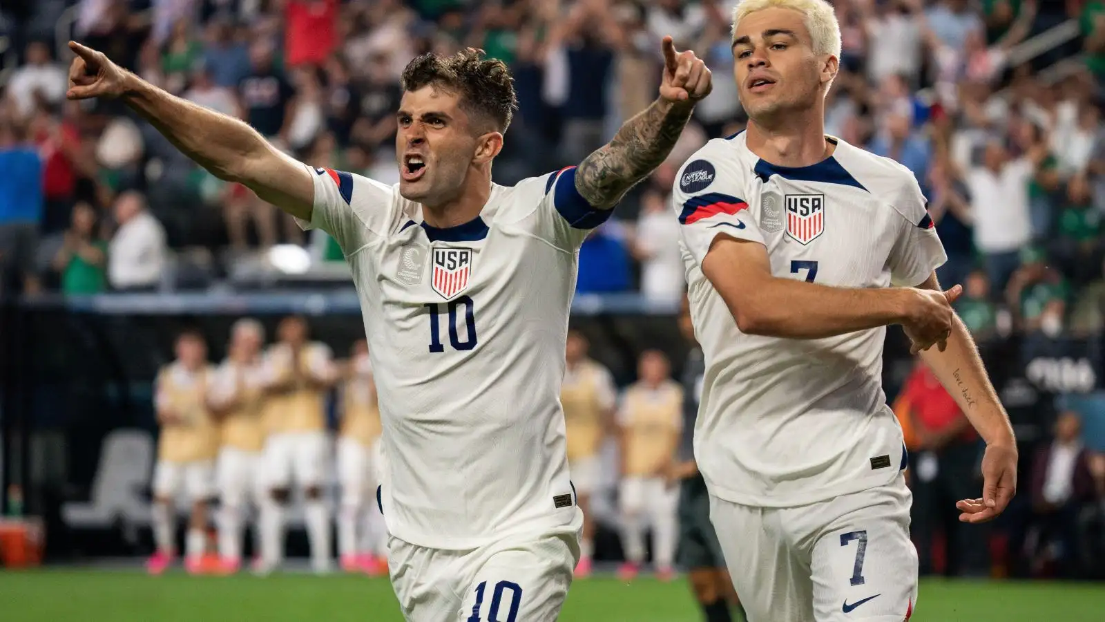 Chelsea winger Christian Pulisic celebrates a goal for the United States.