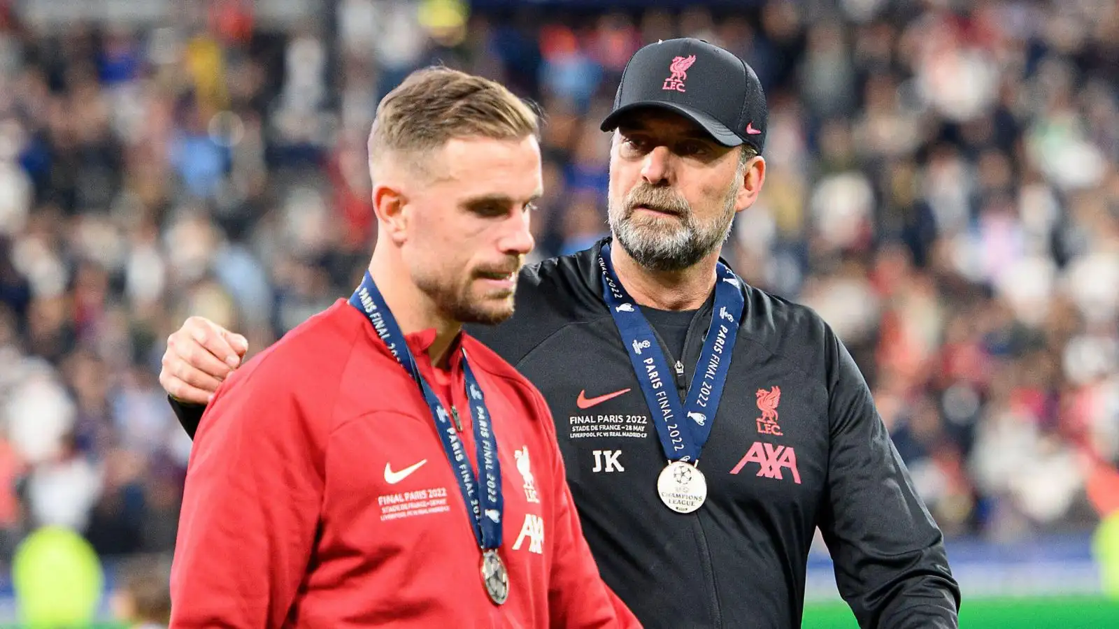 Jordan Henderson is consoled by Liverpool manager Jurgen Klopp