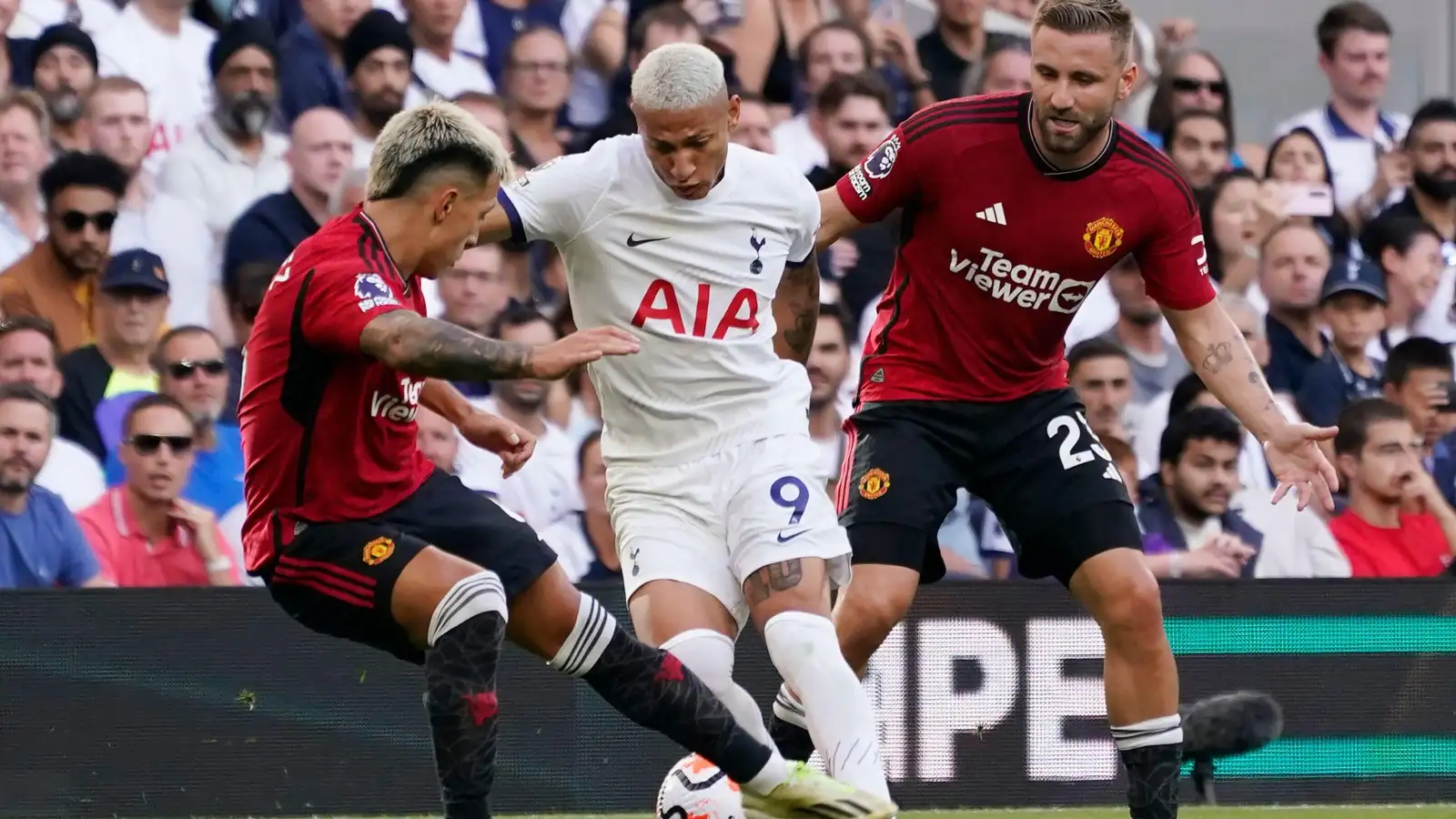 Luke Shaw and Lisandro Martinez challenge Richarlison during Man Utd's defeat at Tottenham.