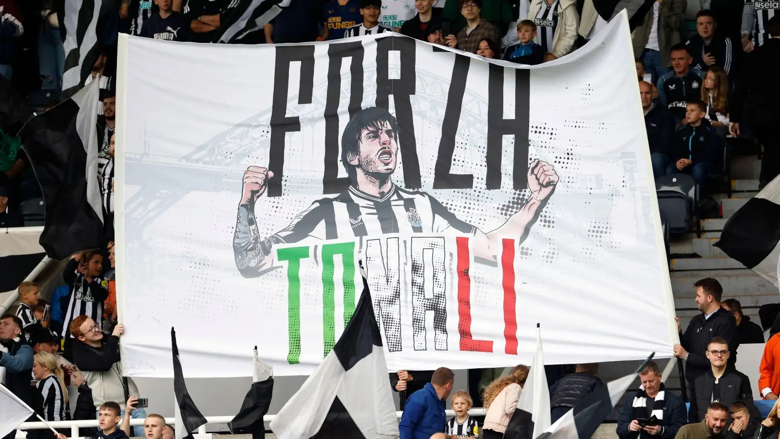 Newcastle fans display a banner in honour of Sandro Tonali.