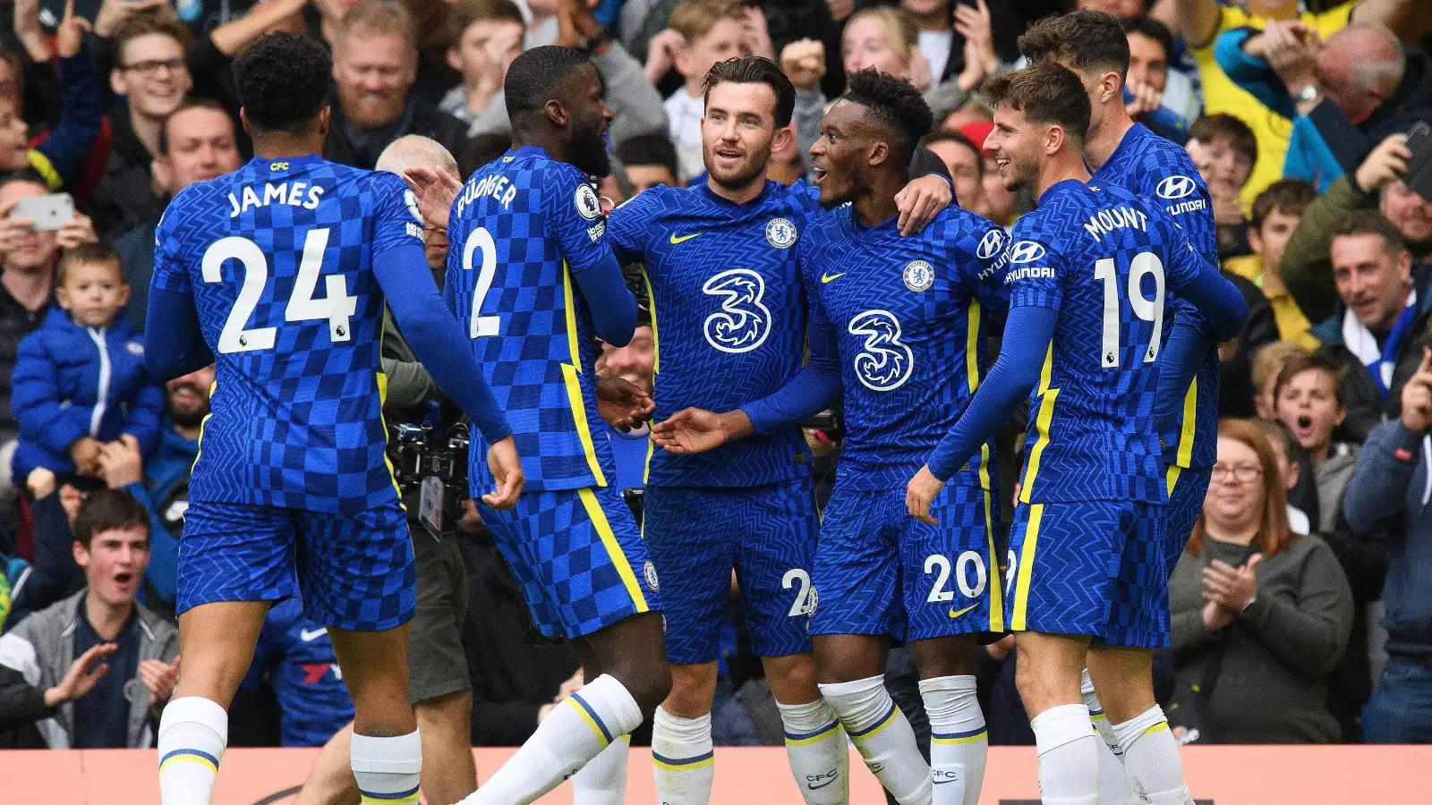 Callum Hudson-Odoi celebrates a goal with his Chelsea teammates.