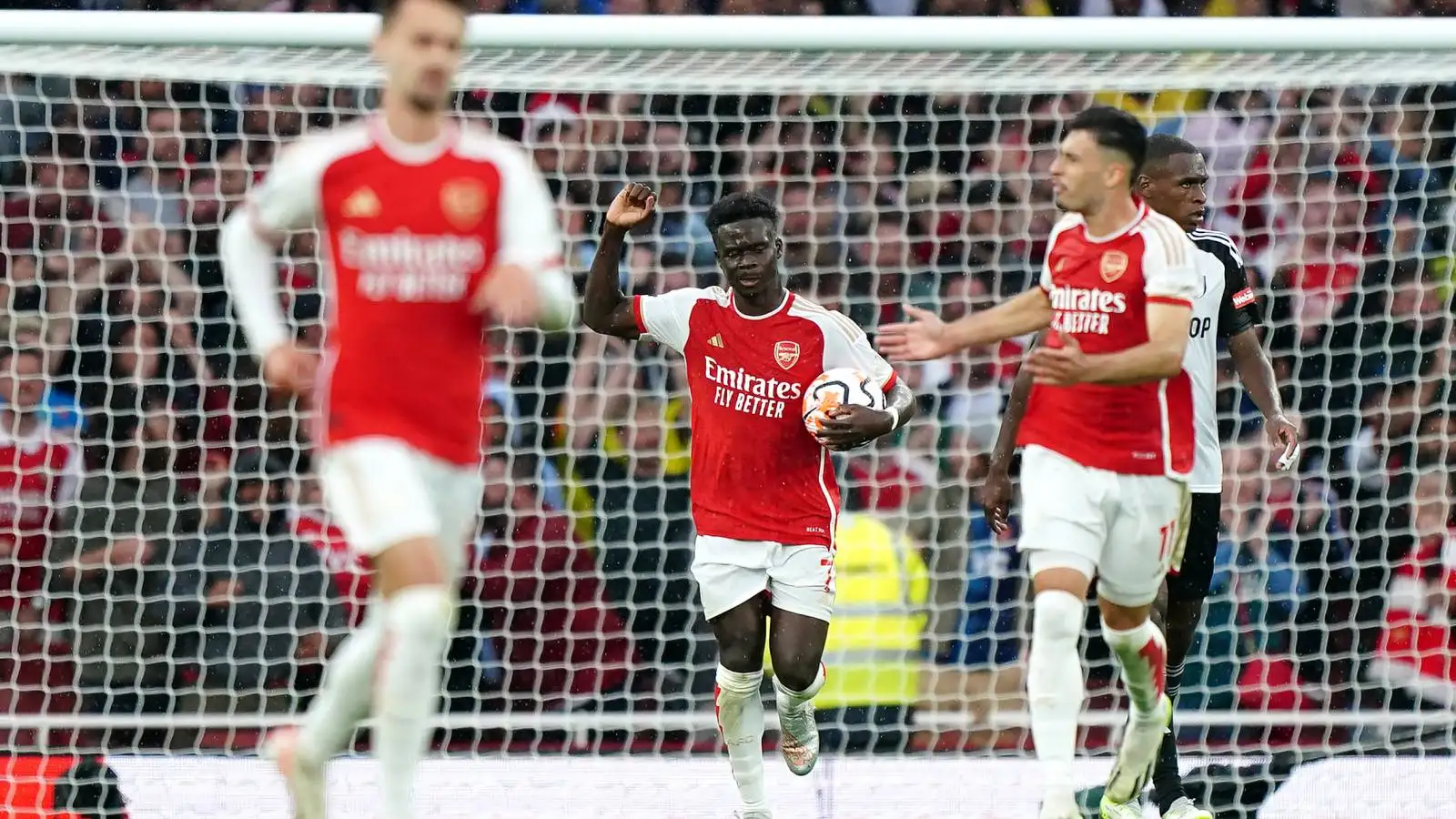 Bukayo Saka celebrates after scoring for Arsenal against Fulham