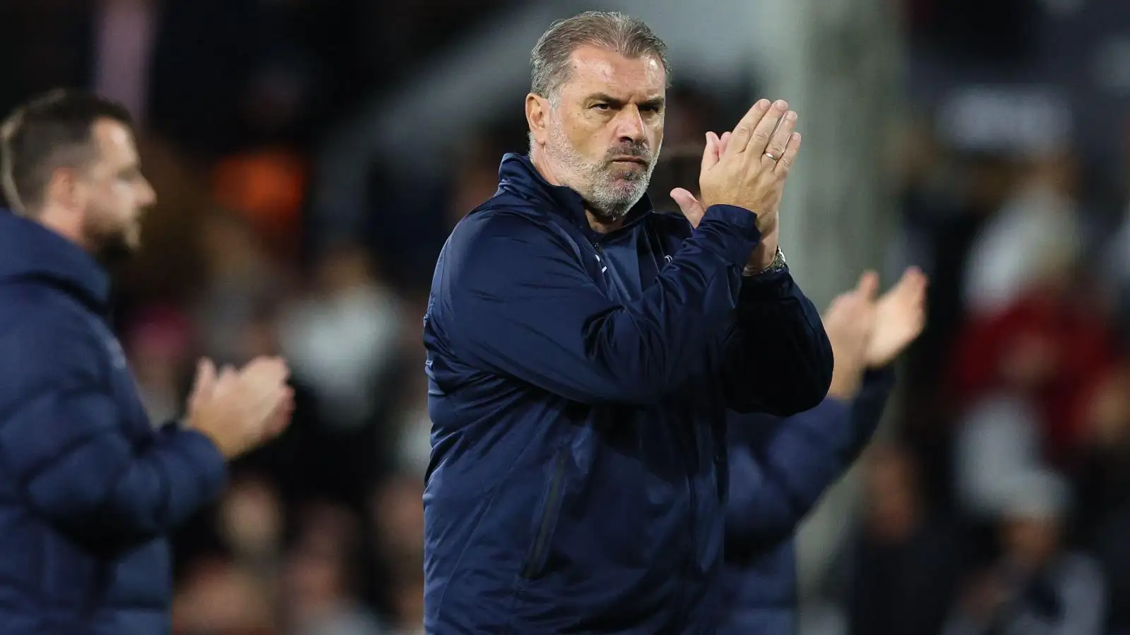 Ange Postecoglou applauds the fans after a defeat.