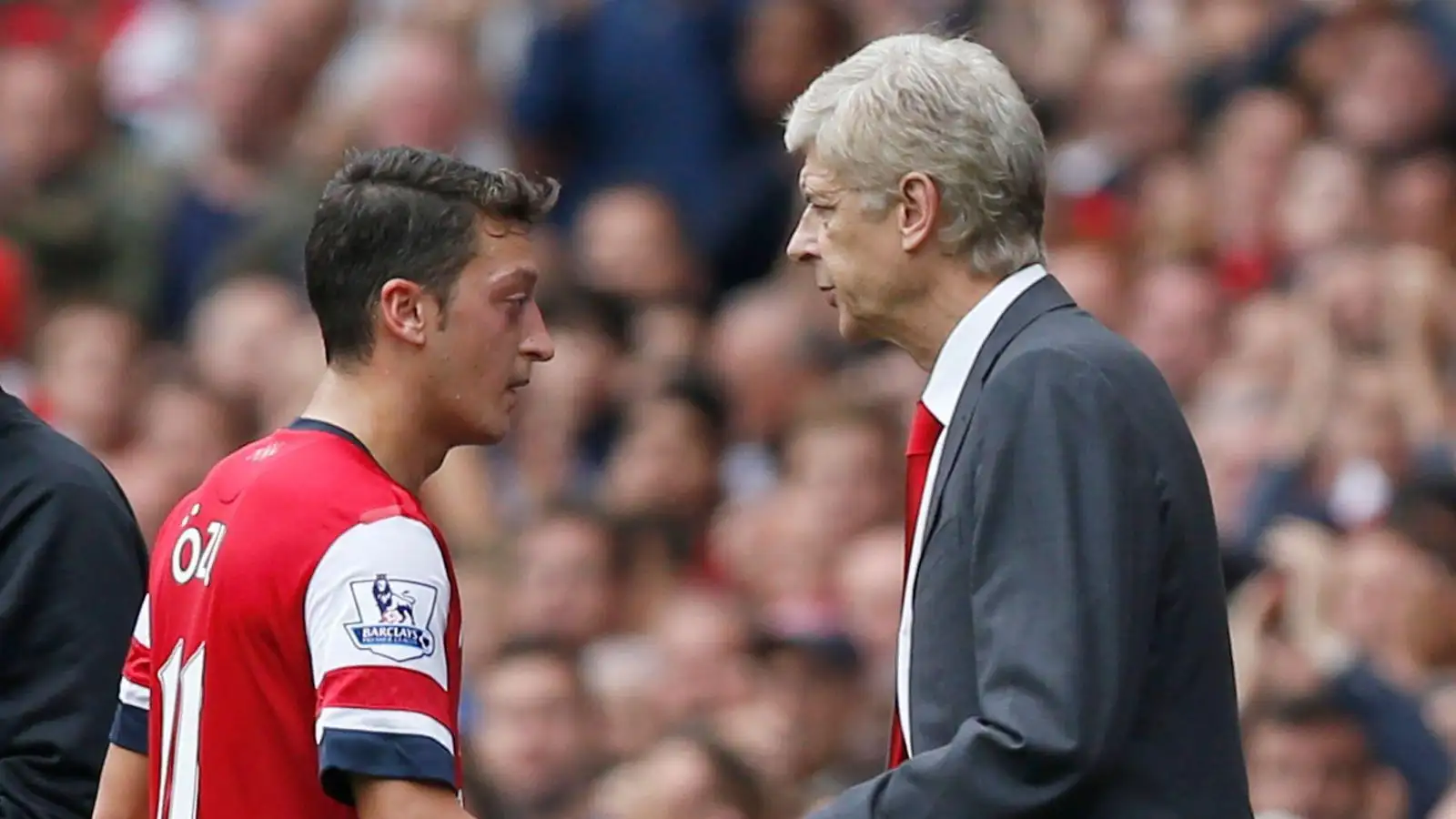 Arsenal player Mesut Ozil and Arsene Wenger