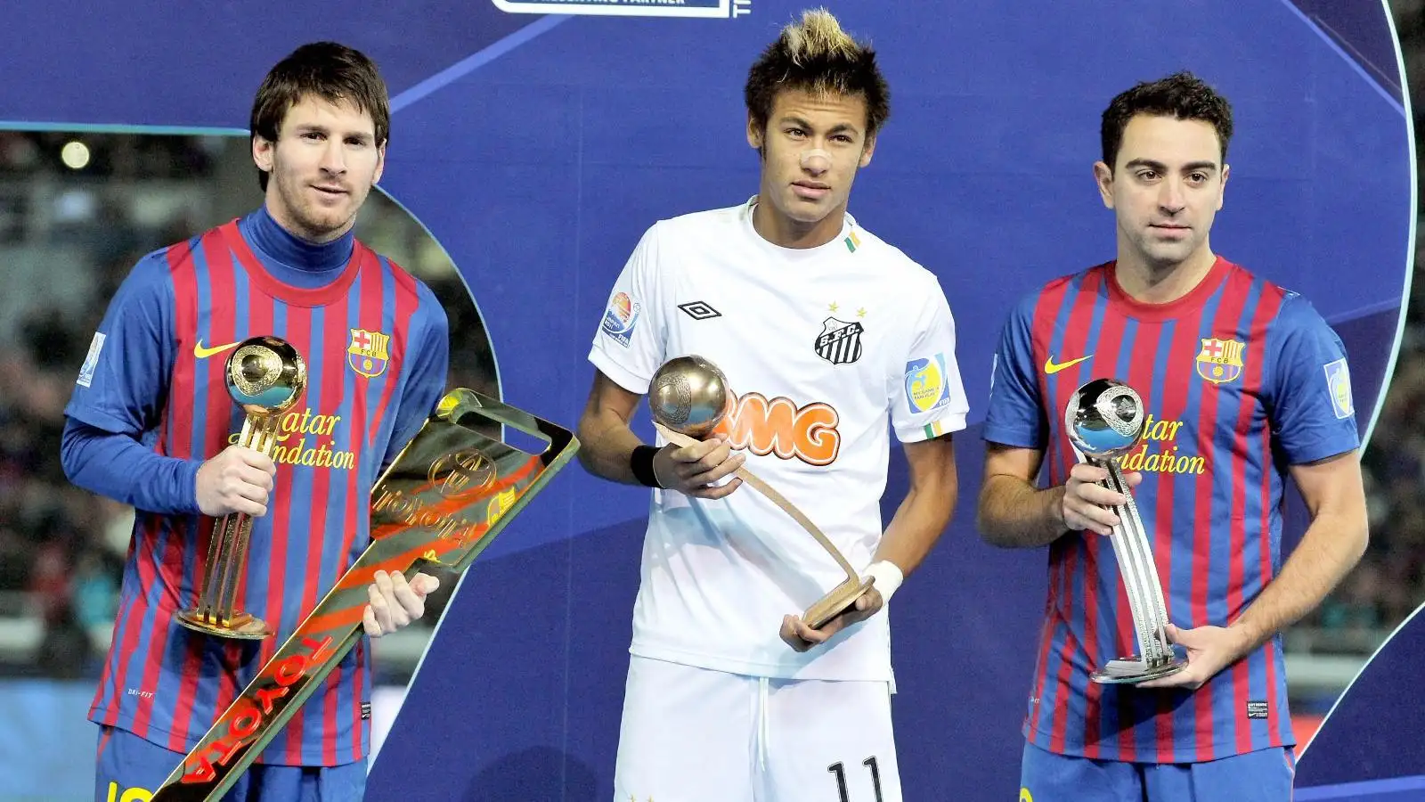 Neymar stands donning Lionel Messi and also Xavi.