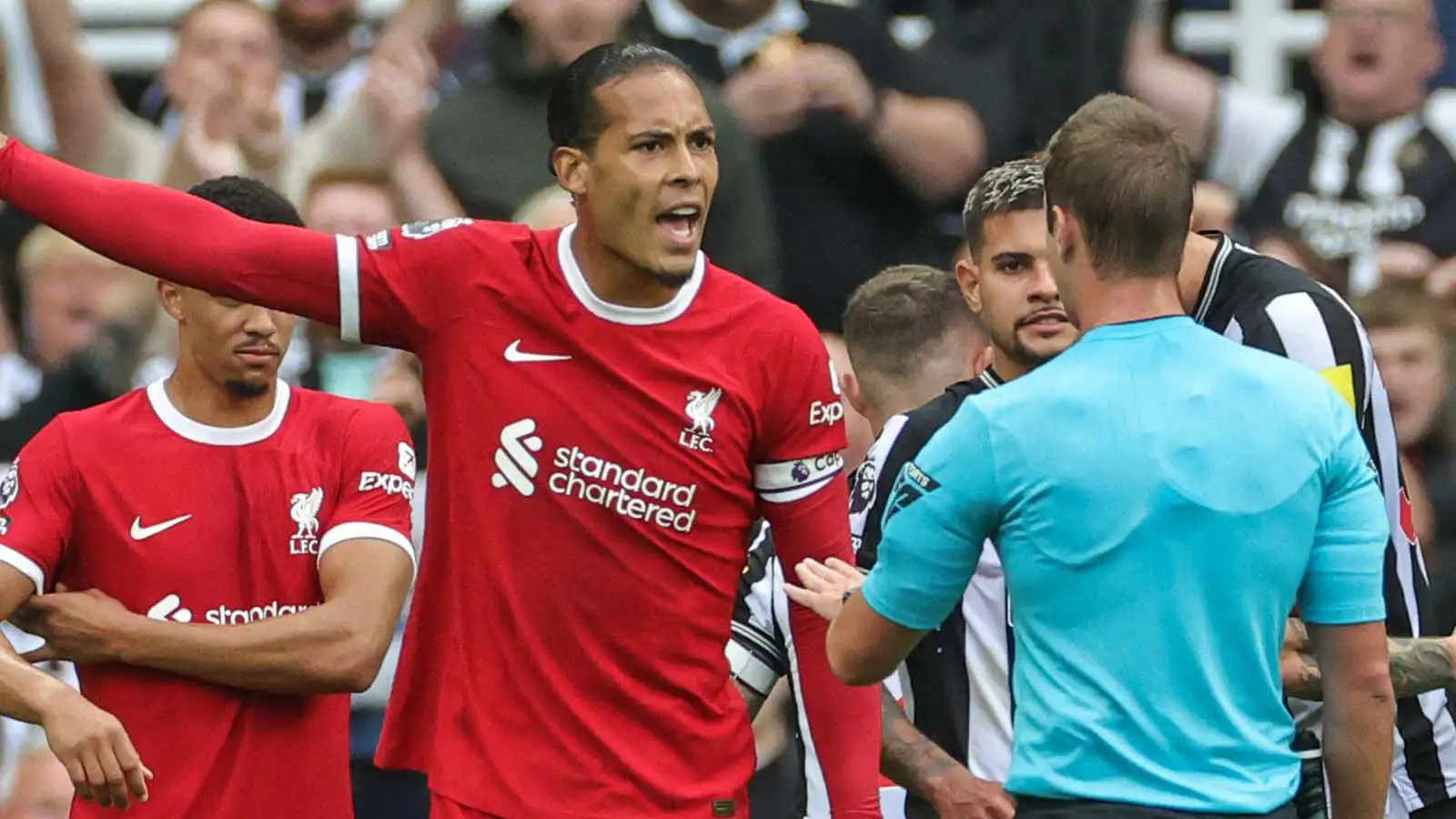 Virgil van Dijk #4 of Liverpool appeals to a red card
