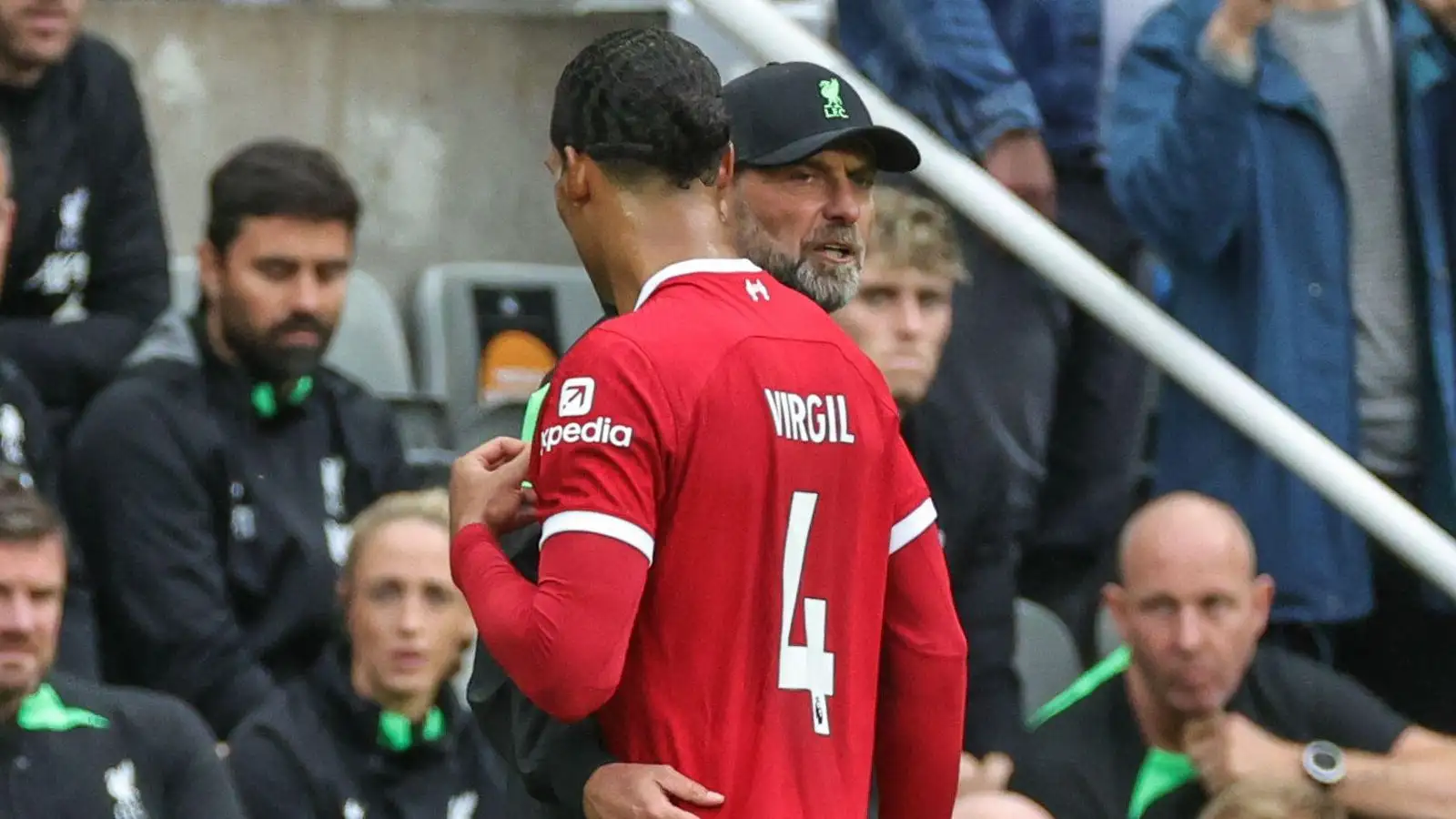Virgil van Dijk is embraced by Liverpool manager Jurgen Klopp