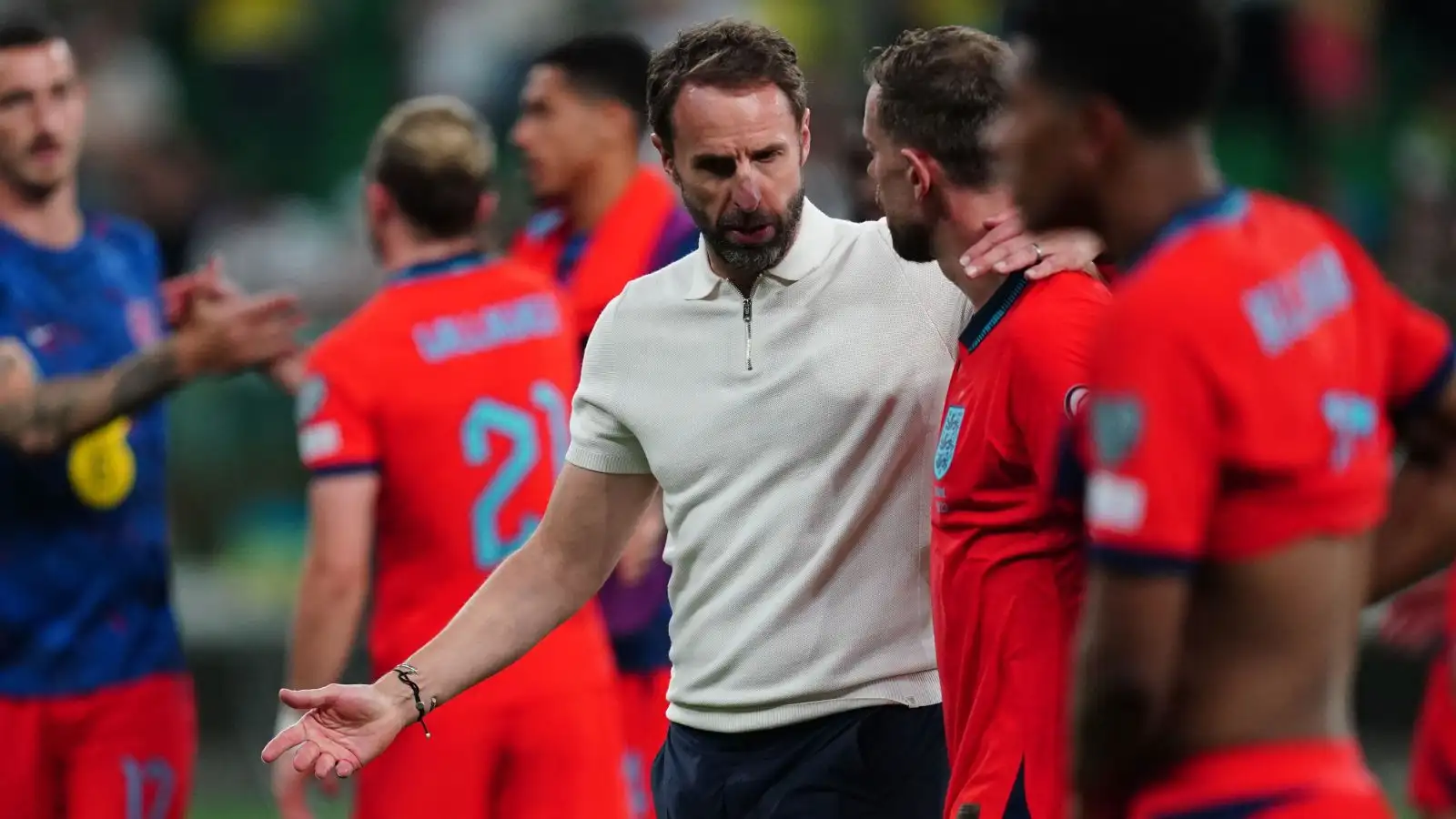 Gareth Southgate talks to Jordan Henderson after England draw 1-1 with Ukraine