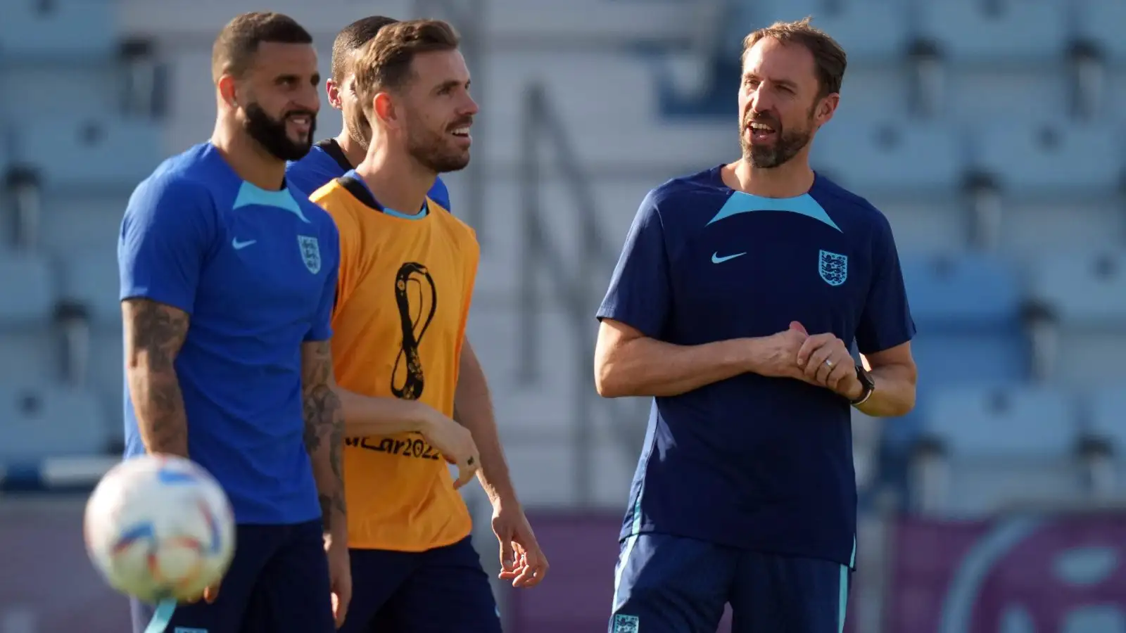 Gareth Southgate with Kyle Walker and Jordan Henderson during a training session.