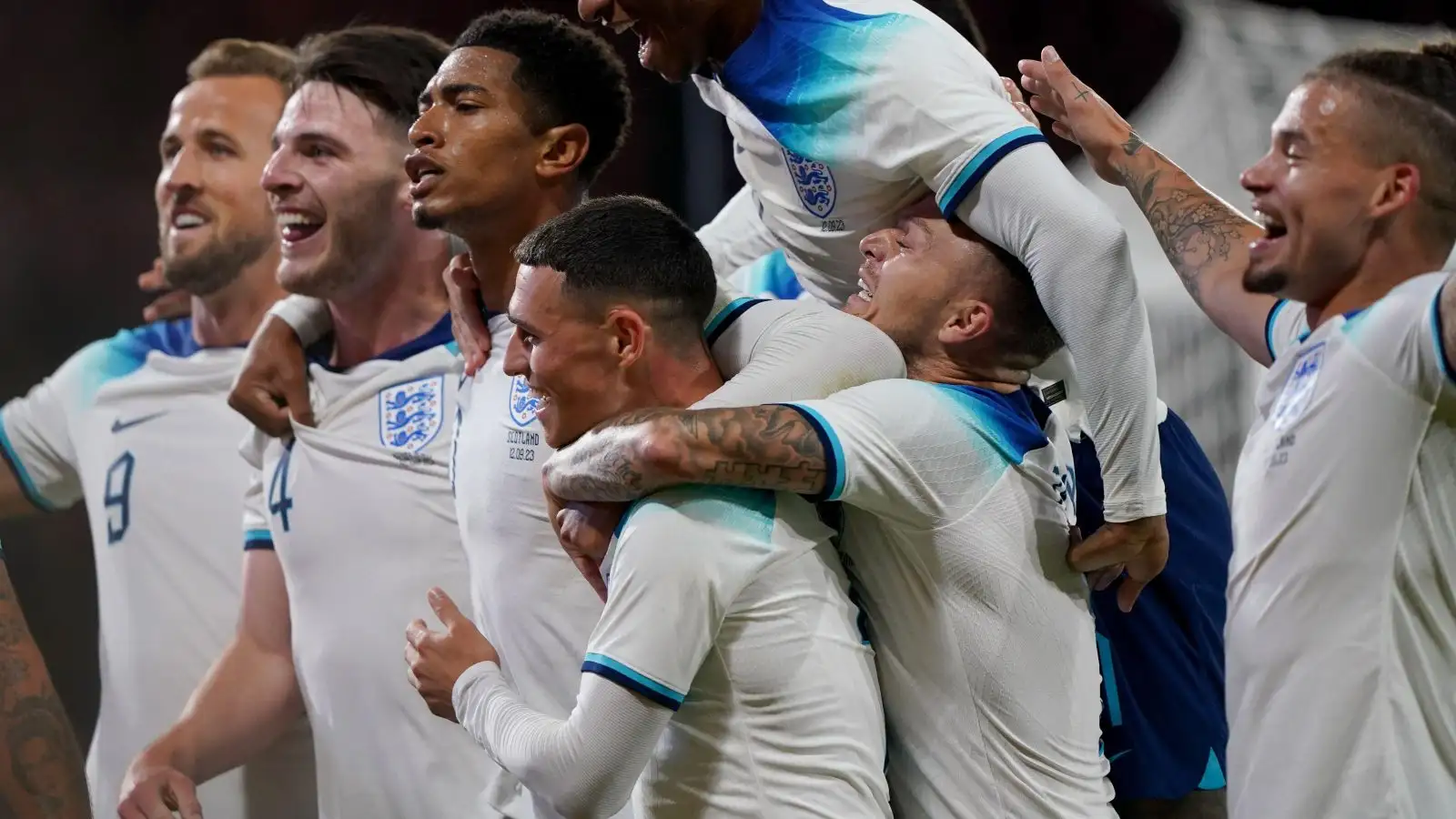 Jude Bellingham celebrates his goal with his England teammates.