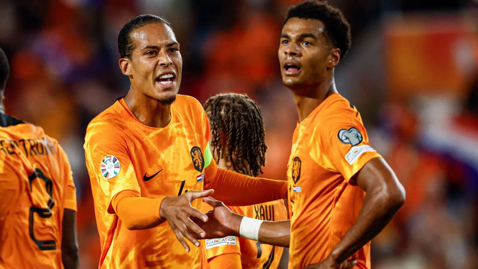 Liverpool duo Virgil van Dijk and Cody Gakpo during a game for the Netherlands.