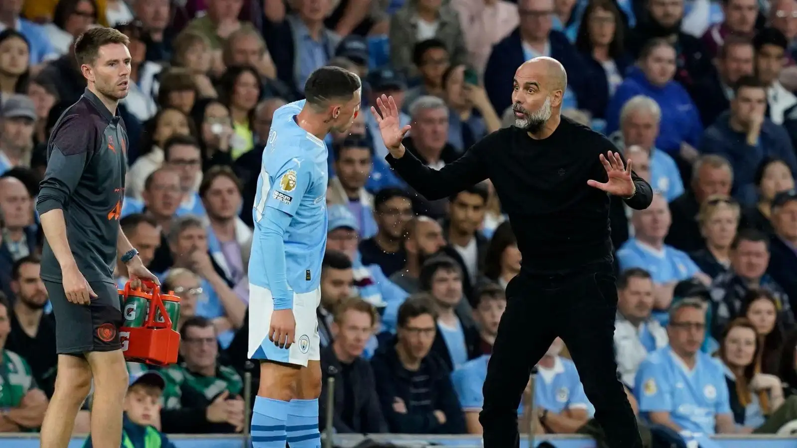 Man City duo Phil Foden and Pep Guardiola