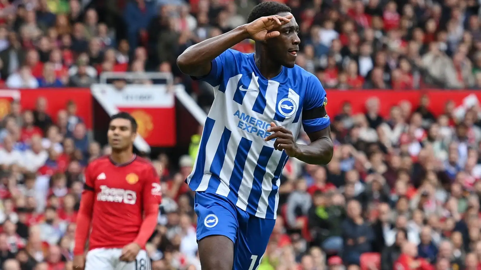 Danny Welbeck celebrates after opening the scoring for Brighton against Manchester United.