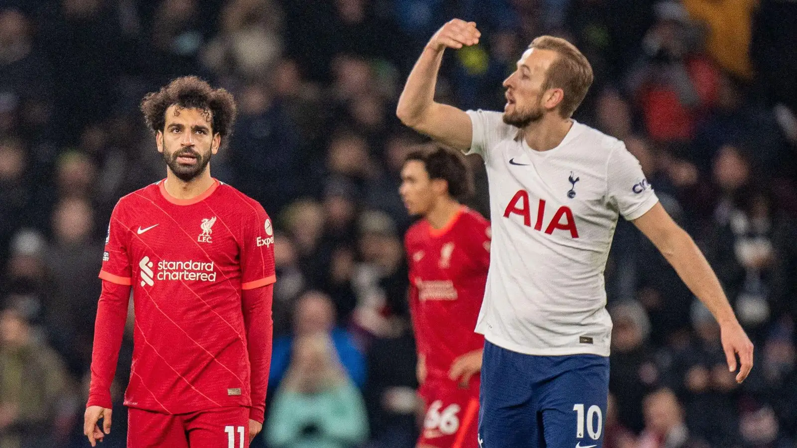 Liverpool forward Mo Salah and Spurs striker Harry Kane react
