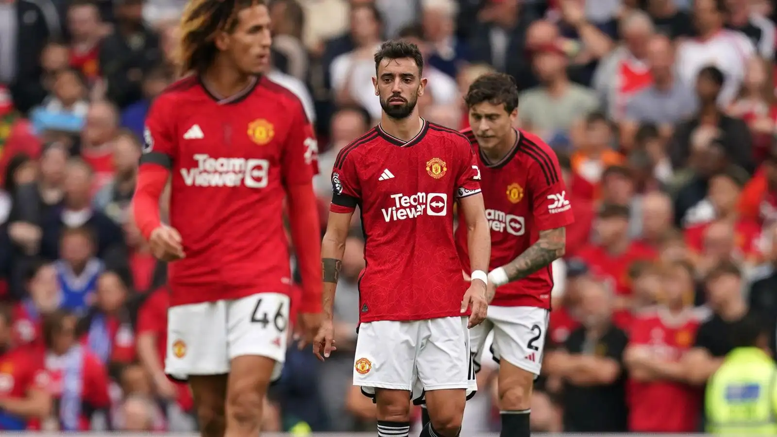 Manchester United midfielder Bruno Fernandes looks dejected after conceding a goal.