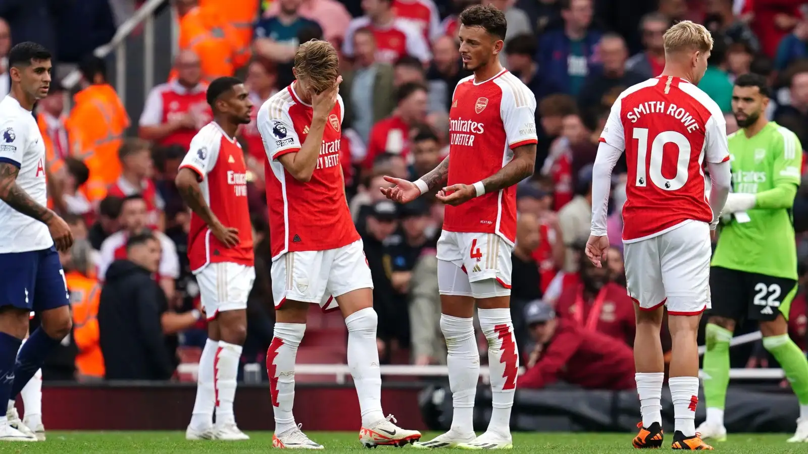 Ben White and his Arsenal team-mates react after the final whistle in the north London derby.