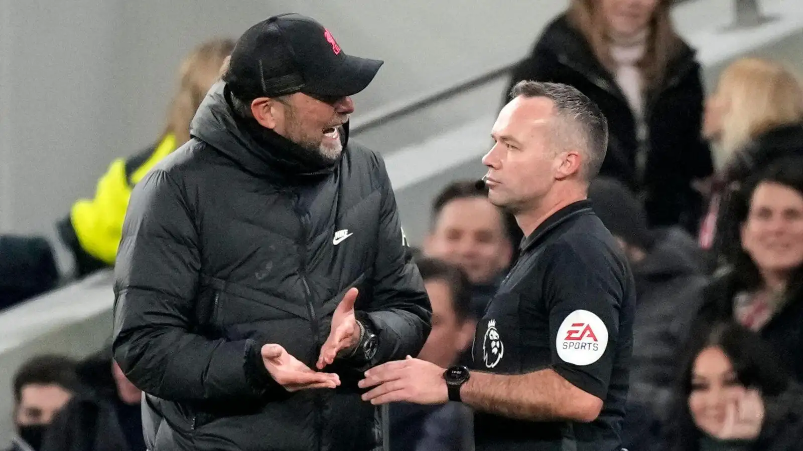 Liverpool manager Jurgen Klopp argues with referee Paul Tierney