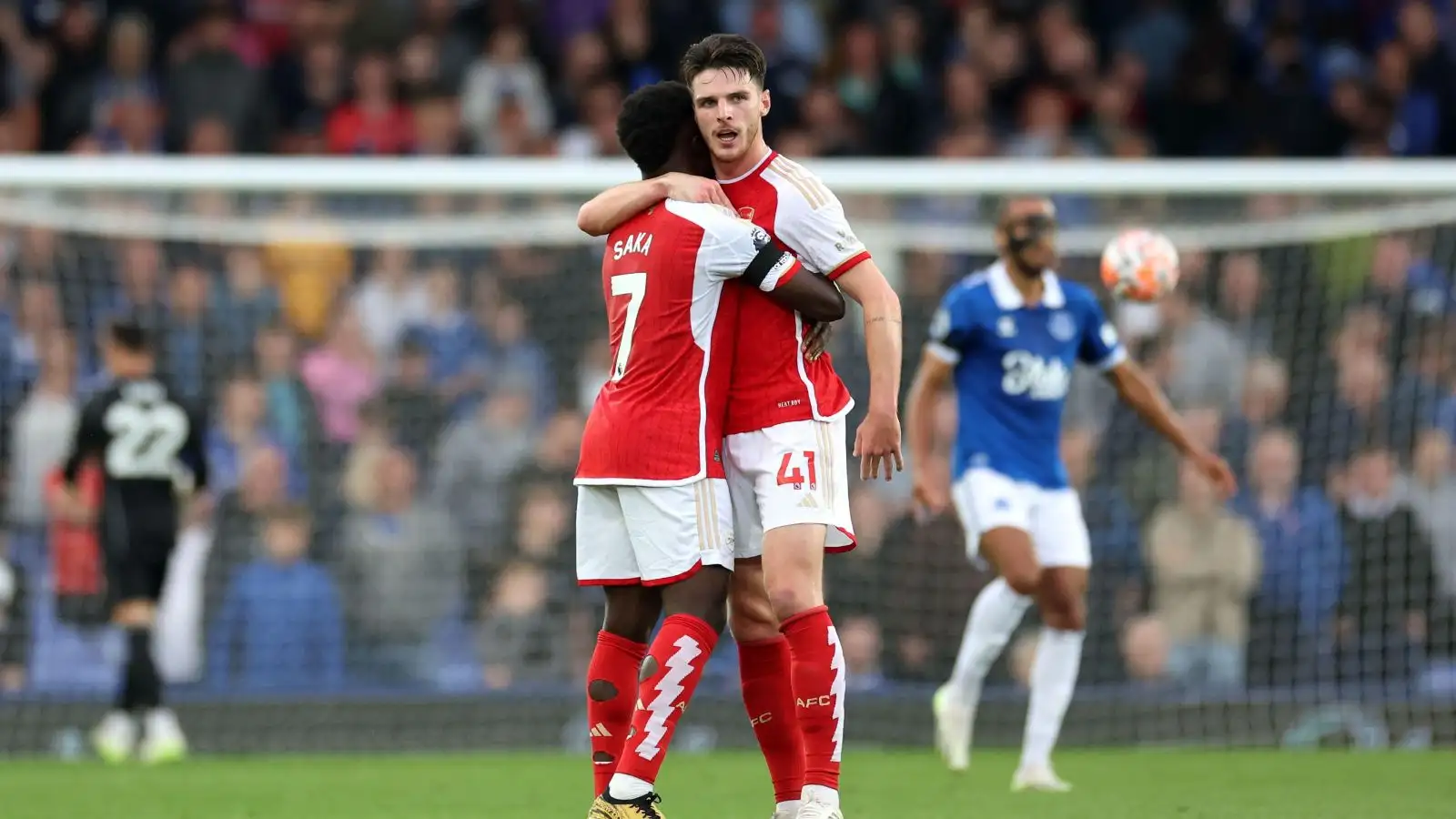 Arsenal midfielder Declan Rice hugs Bukayo Saka